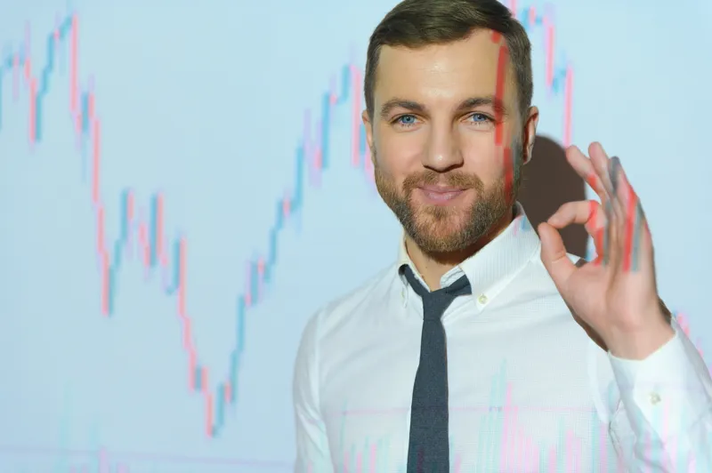 a forex trader in a white shirt and tie